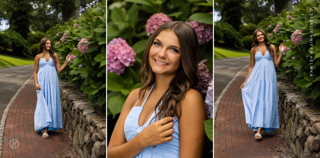 Editorial senior portrait of high school senior wearing a light blue maxi dress beside blooming hydrangeas during a senior photography session in Chatham, Cape Cod, Massachusetts with Jennifer Helmka, Photographer.