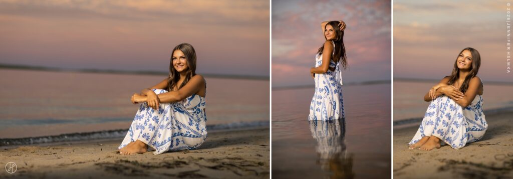 Editorial senior portrait of high school senior sitting on the beach beneath a pastel sunset sky during a senior photography session in Chatham, Cape Cod, Massachusetts with Jennifer Helmka, Photographer.